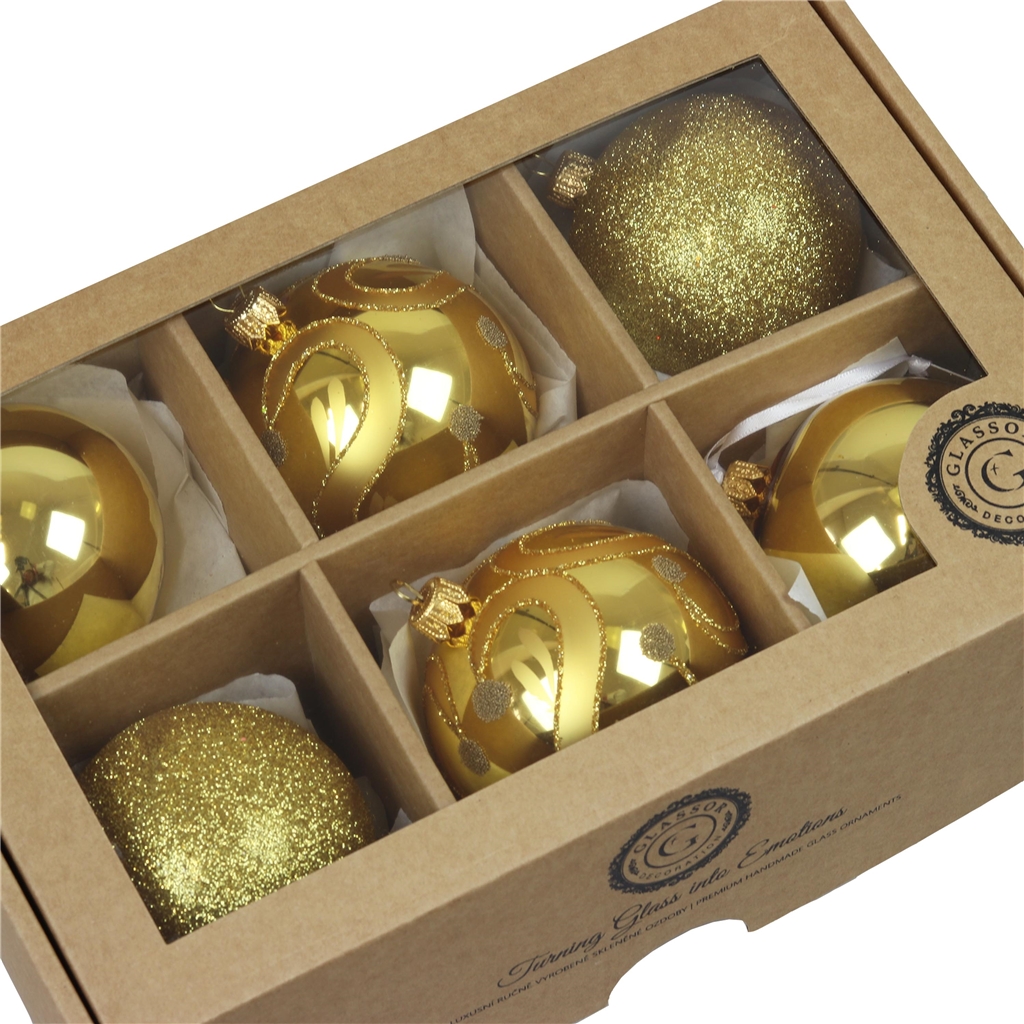 Satz goldene Weihnachtskugeln mit Glitzer