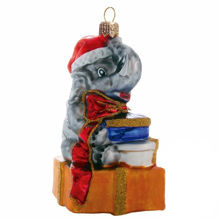 Elefant aus Glasmit Geschenken
