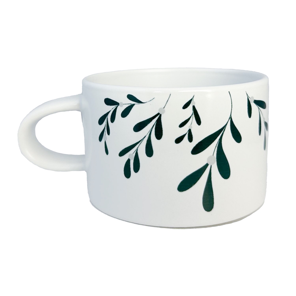 Weißer Becher mit Mistelzweig Dekoration