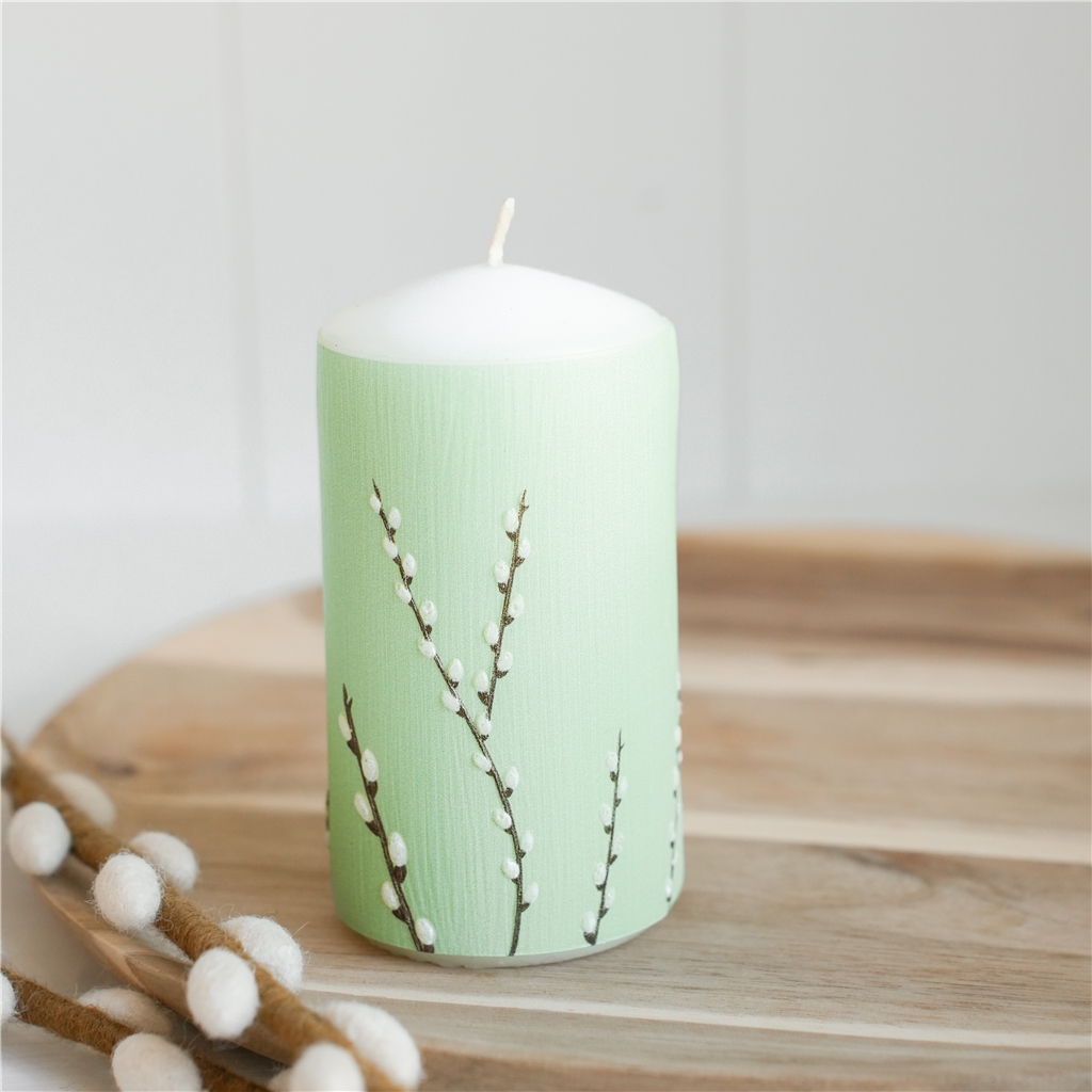 Pastellgrüne Kerze mit Katzenmotiv