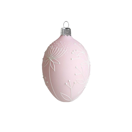 Osterei mit Blumendekoration in Pastellrosa