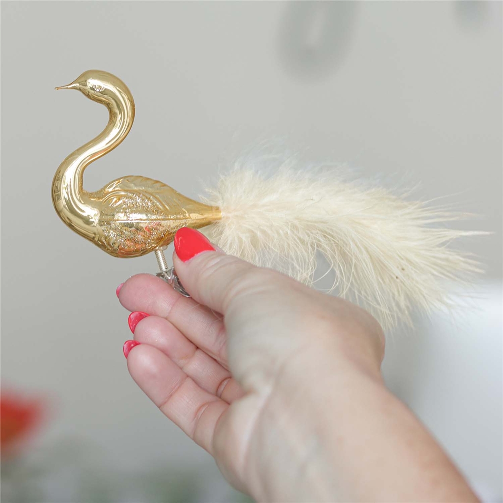 Schwan goldglänzend mit Streuseln