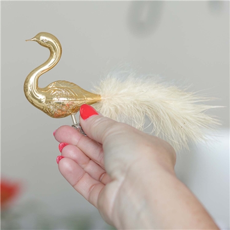 Schwan goldglänzend mit Streuseln